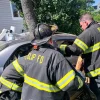 Firefighters Rescue Driver Trapped In Car After Crashing Into Police Vehicle: PD
